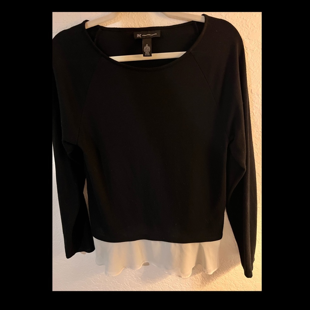 INC International Concepts. Black sweater with ruffle